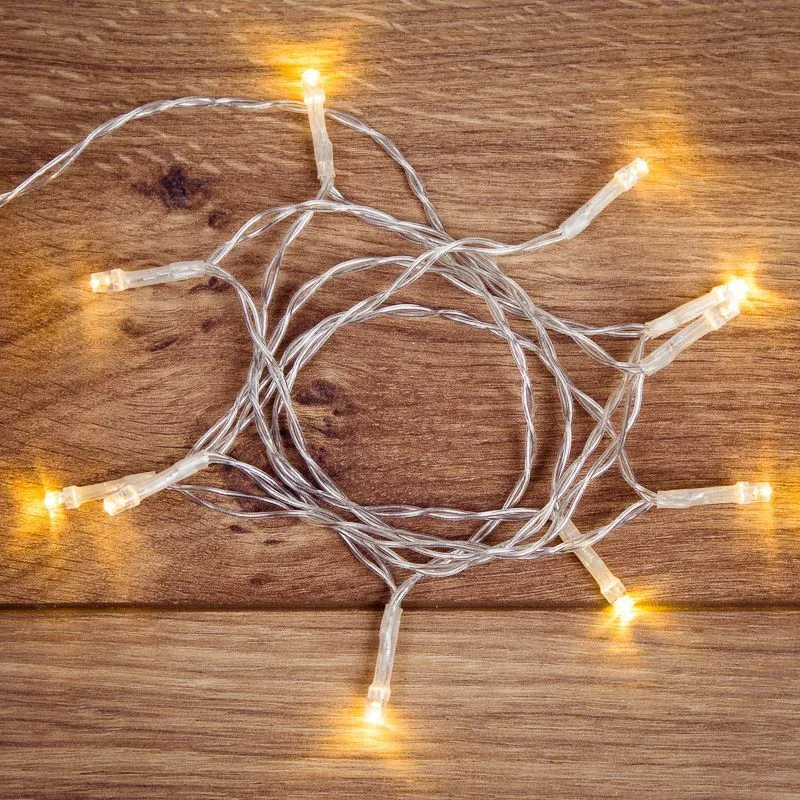 Гирлянда светодиодная универсальная 10 LED, 1,2 метра, прозрачный ПВХ, теплое белое свечение, батарейки 2хАА NEON-NIGHT 303-073