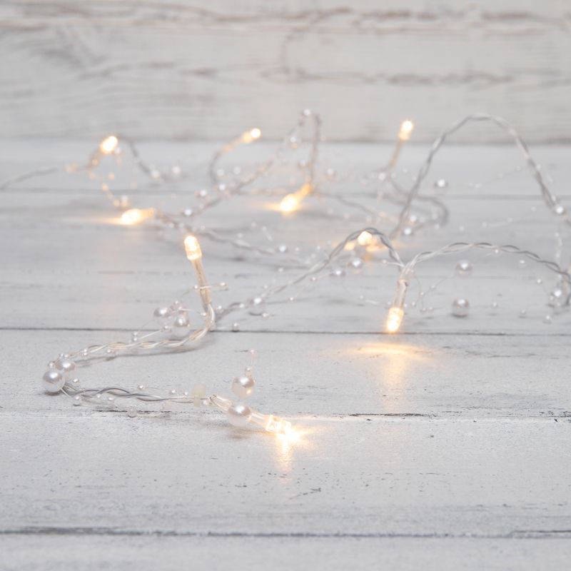 Гирлянда светодиодная Жемчужинки 1,5 м, 10 LED, прозрачный ПВХ, цвет свечения теплый белый, 2 х АА (батарейки не в комплекте) NEON-NIGHT 303-097
