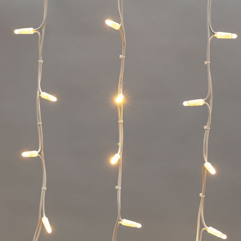 Гирлянда светодиодная Бахрома (Айсикл) 5,6x0,9м 240 LED ТЕПЛЫЙ БЕЛЫЙ белый каучук 3,3мм IP67 эффект мерцания 230В нужен блок 315-001 NEON-NIGHT - Фото 3